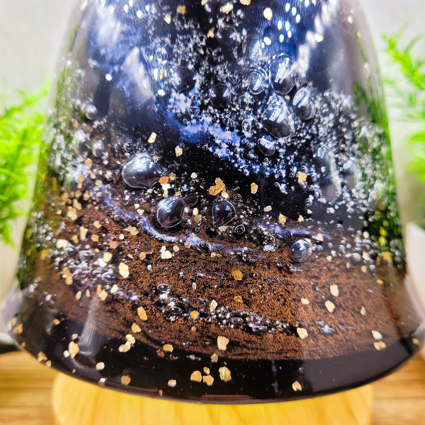 Ashes in glass table lamp