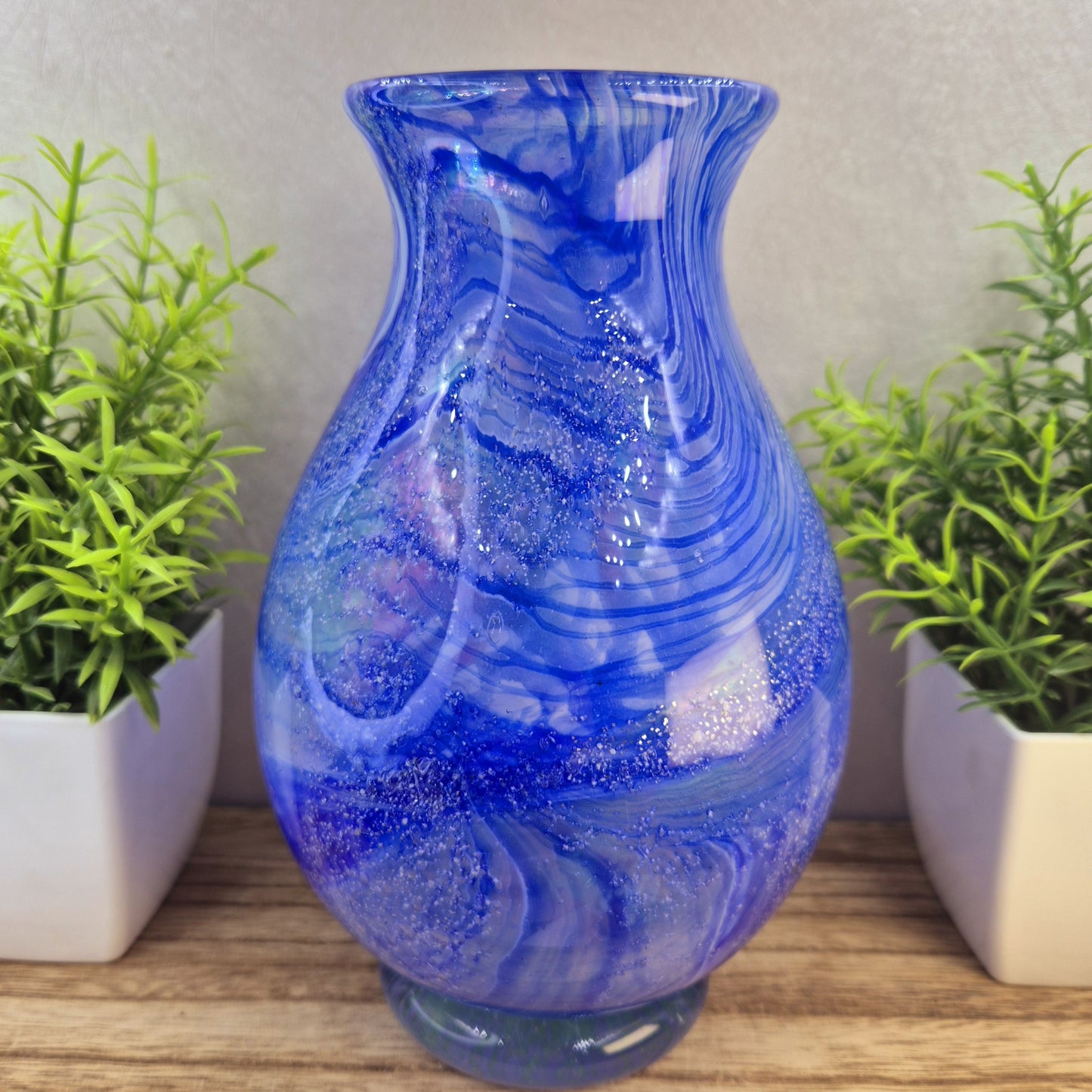 Ashes in glass memorial vase