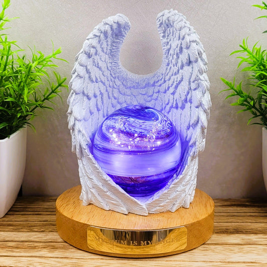 Ashes in glass memorial angel wings with orb lamp