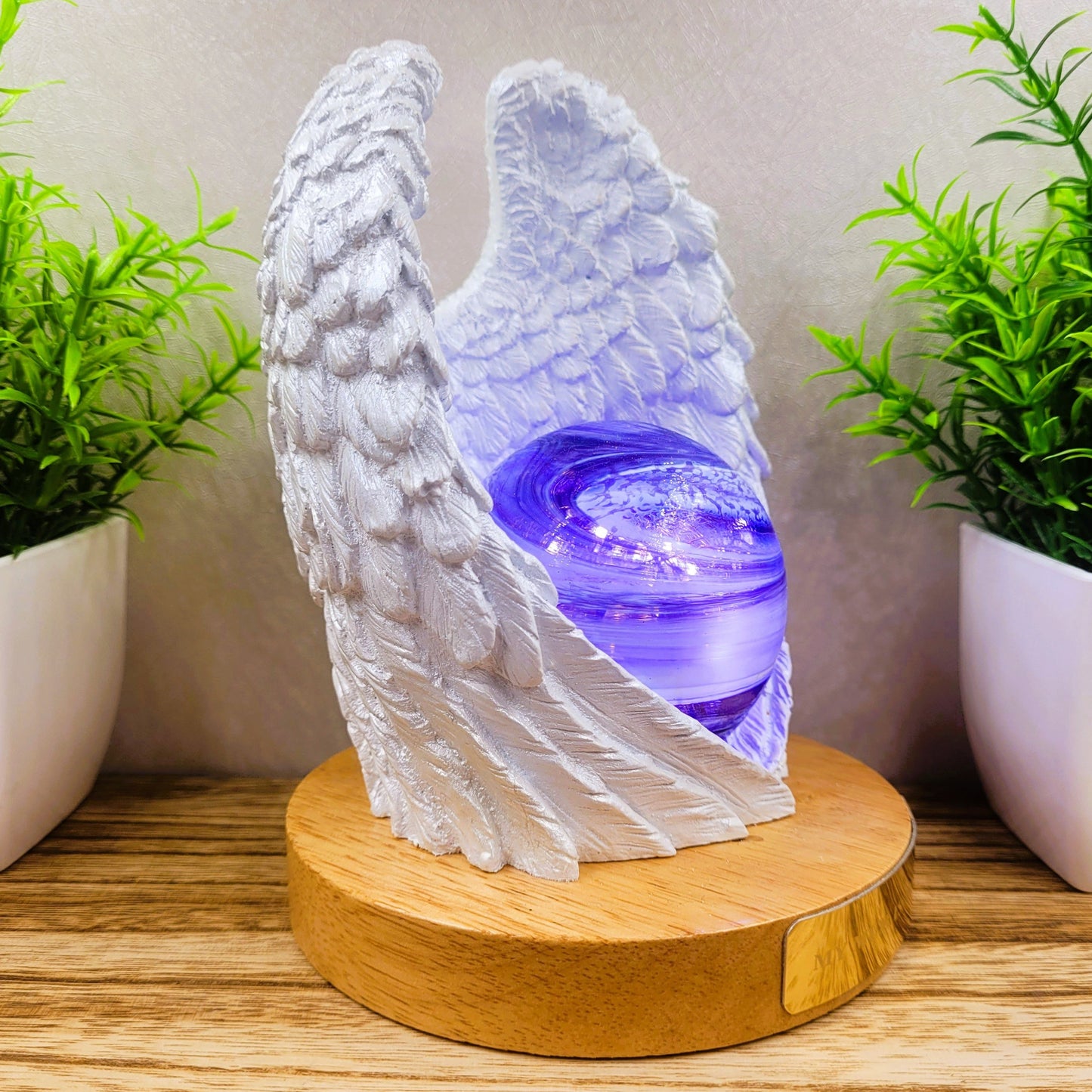 Ashes in glass memorial angel wings with orb lamp