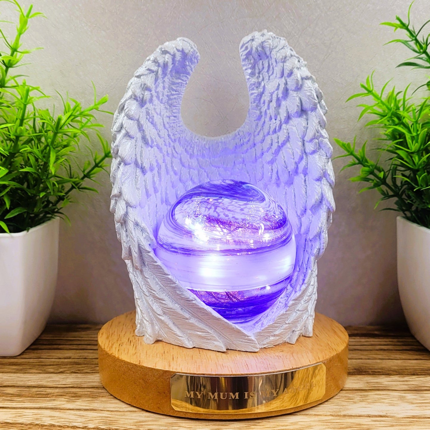 Ashes in glass memorial angel wings with orb lamp