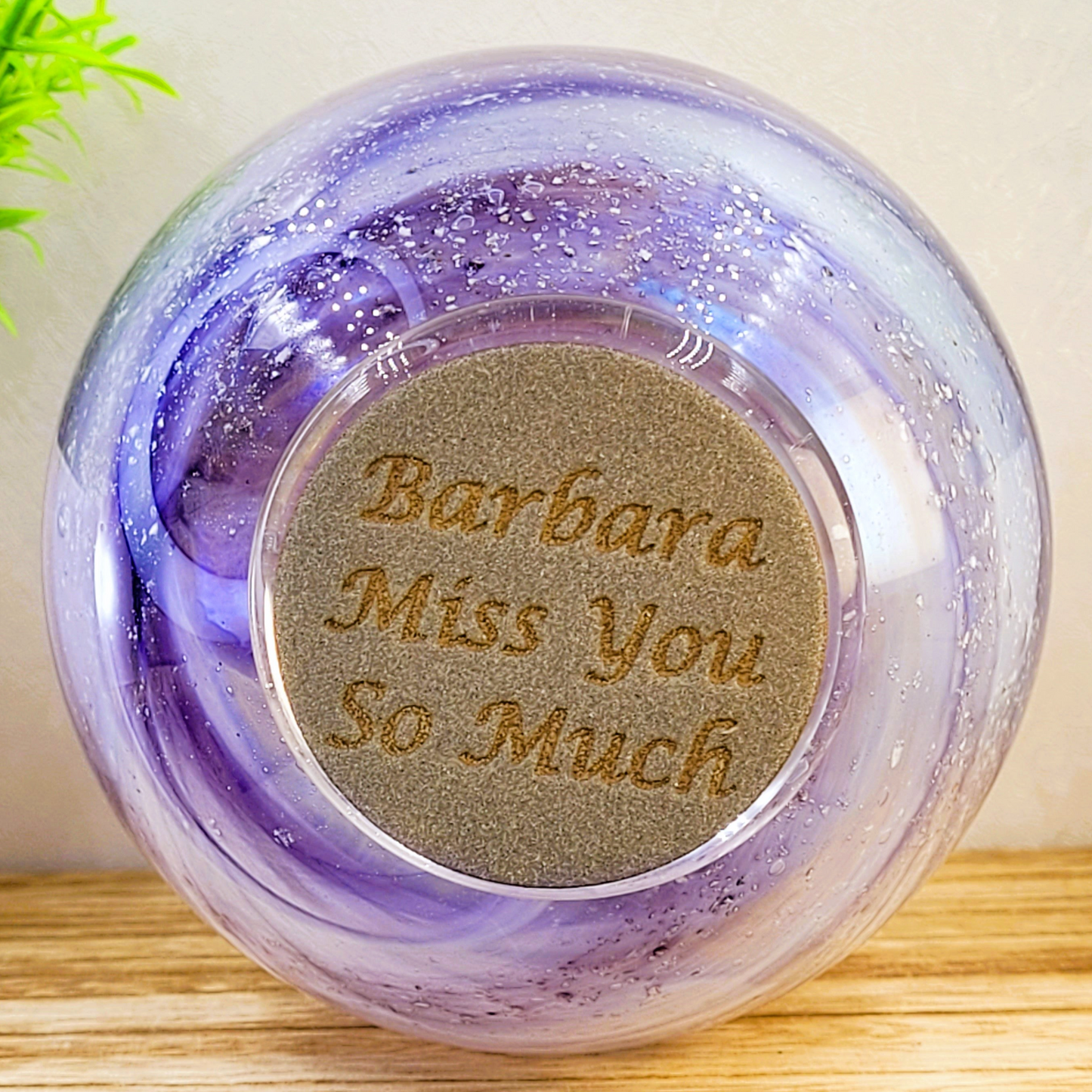 Ashes in glass memorial vase