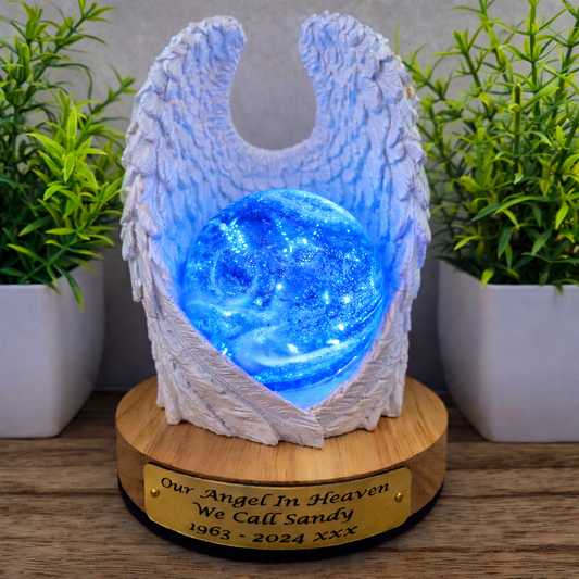 Ashes in glass memorial angel wings with orb lamp