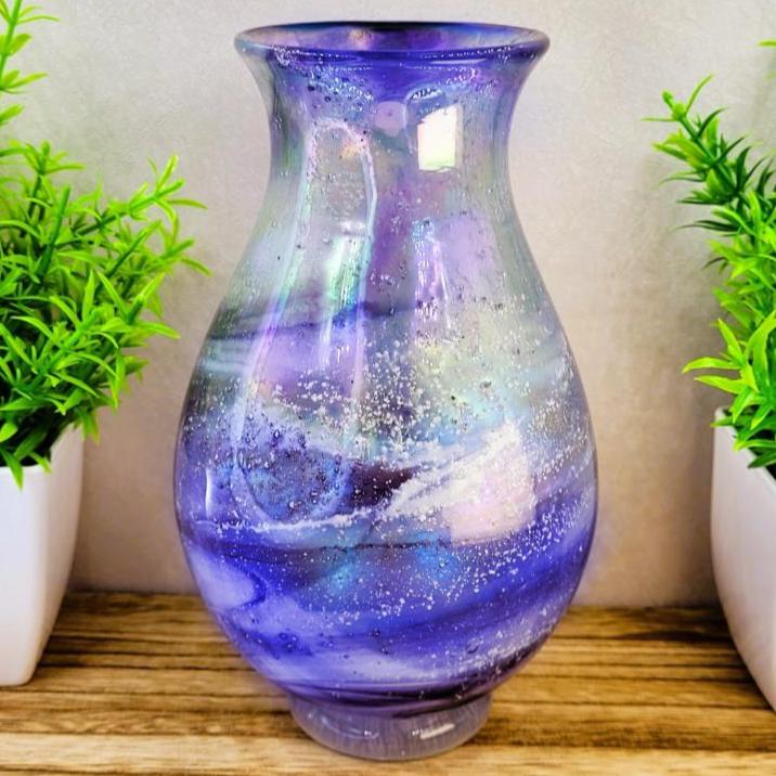 Ashes in glass memorial vase