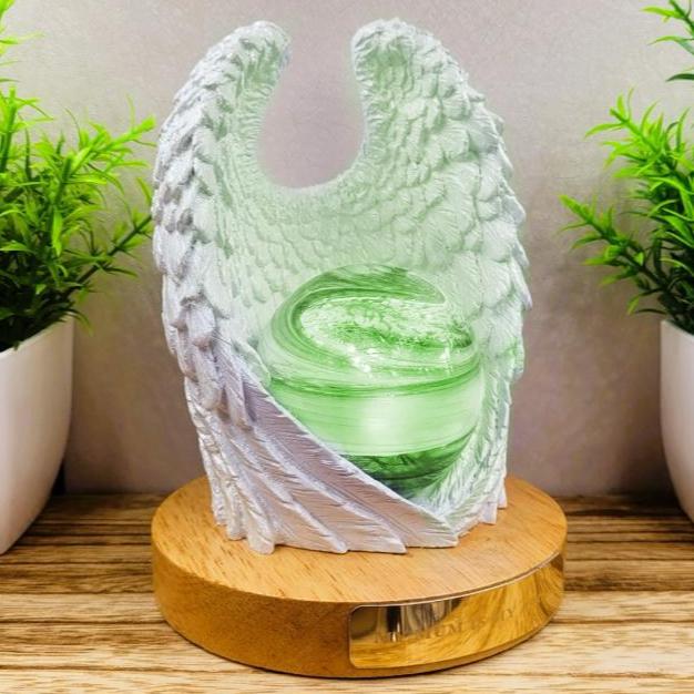 Ashes in glass memorial angel wings with orb lamp