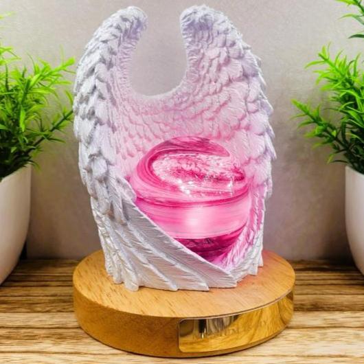 Ashes in glass memorial angel wings with orb lamp