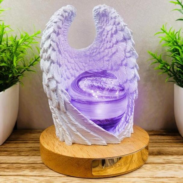 Ashes in glass memorial angel wings with orb lamp