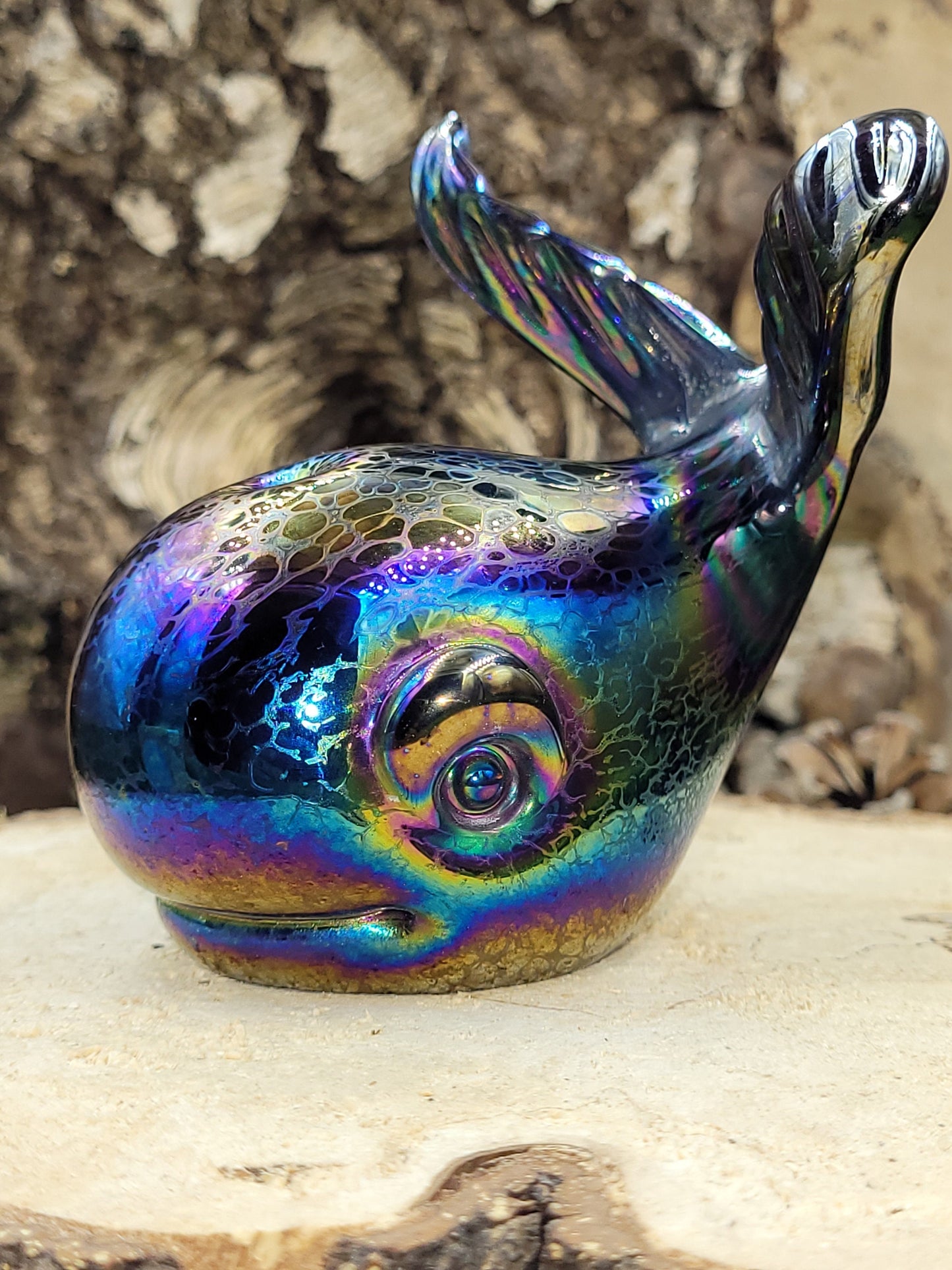 Iridescent glass whales