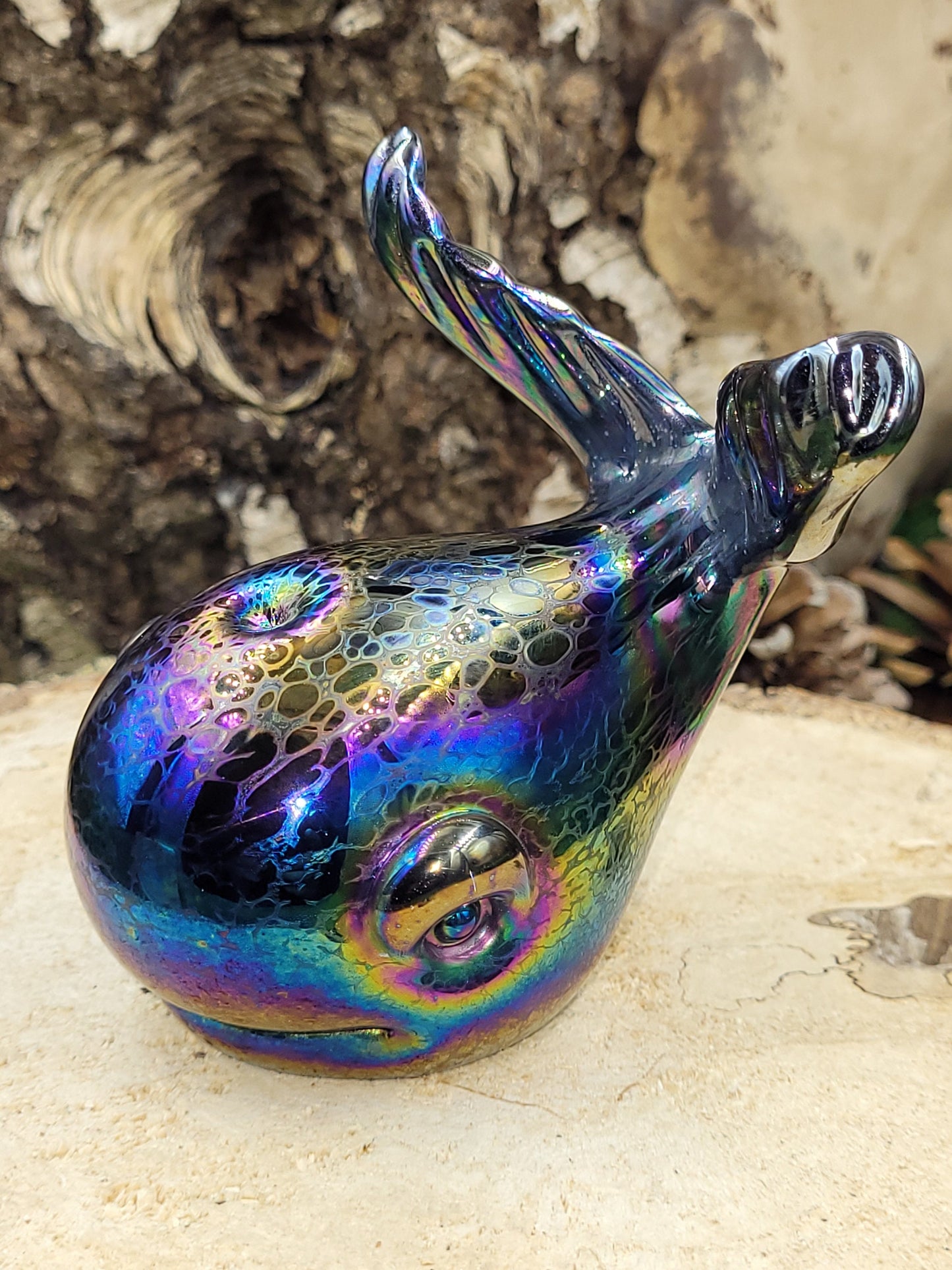 Iridescent glass whales