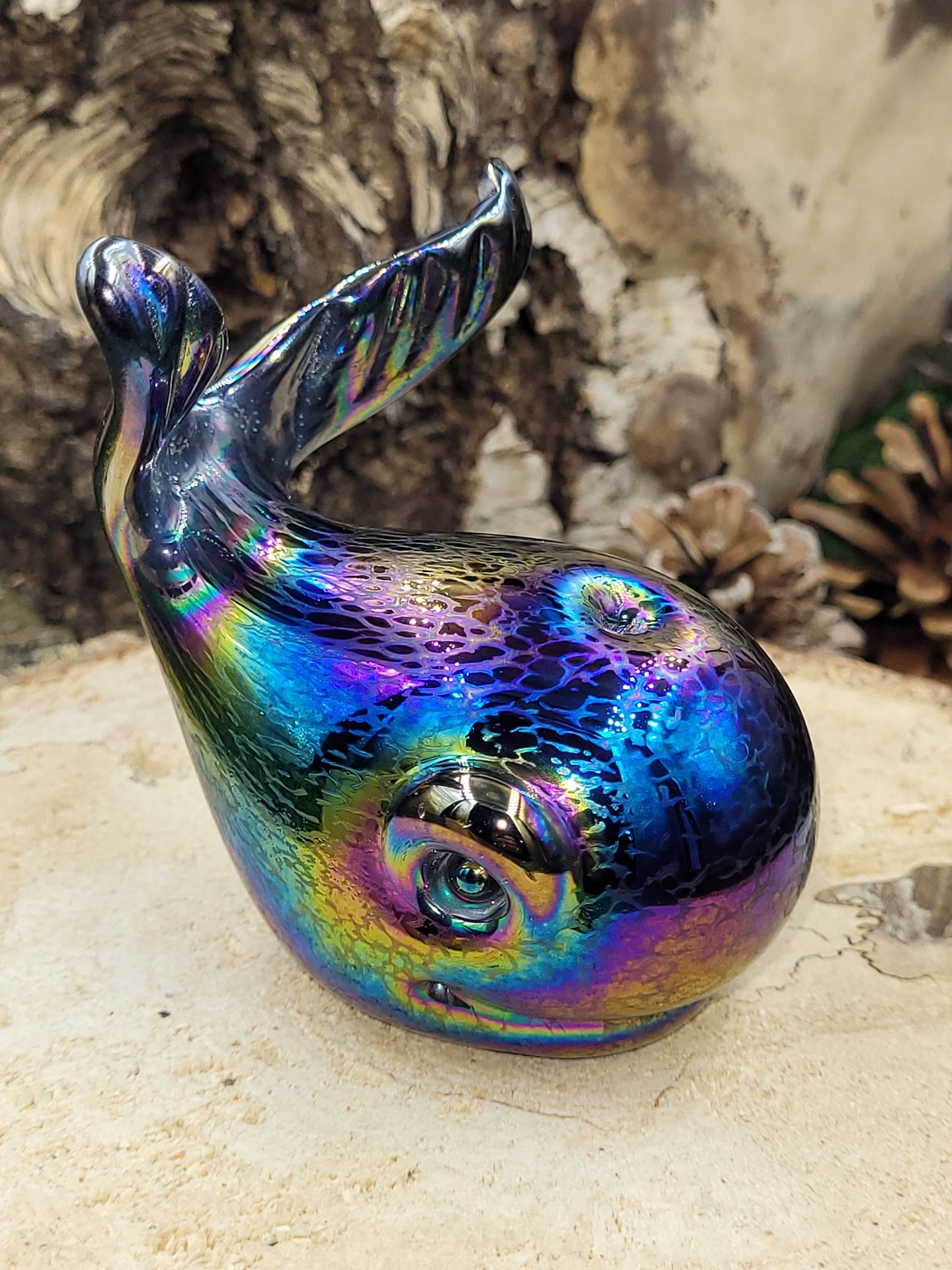 Iridescent glass whales